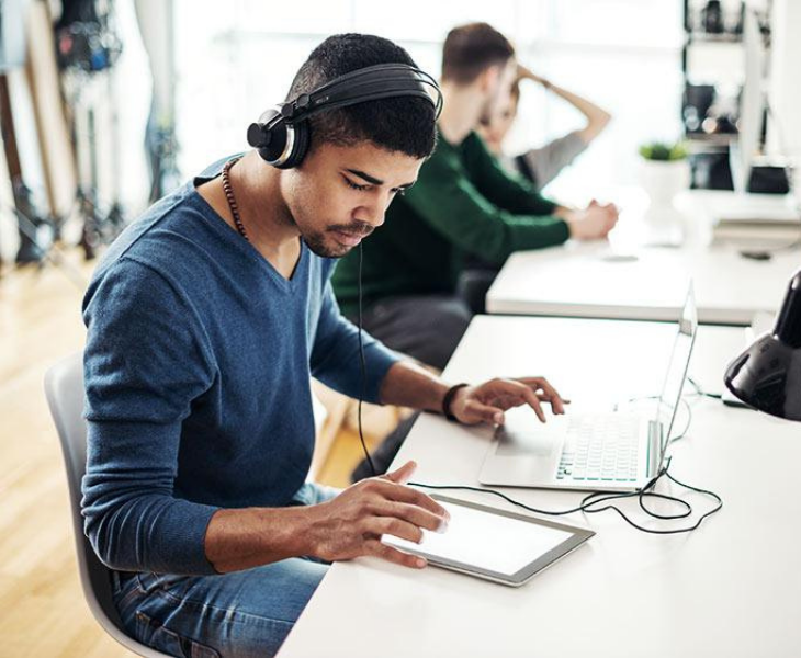 Man listening to music at work