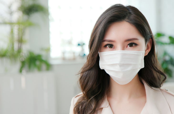 Professional Woman Wearing Disposable Face Mask