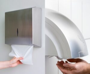 Hand towel and hand dryer in workspace