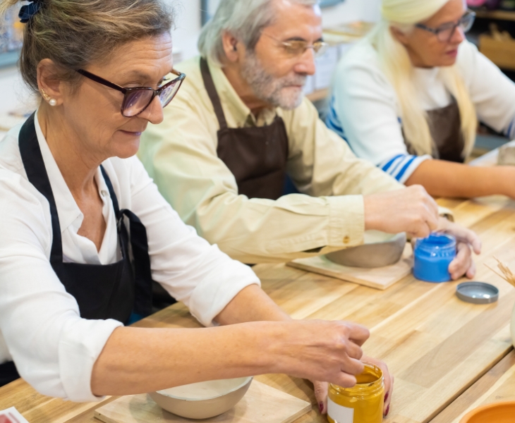 Elderly doing art and craft stuff