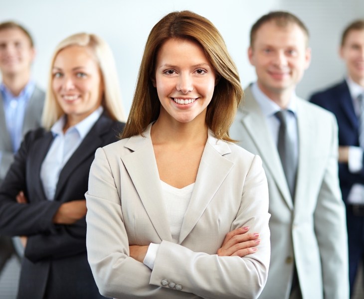 Lady standing in front in the workplace