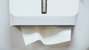 A paper towel bathroom dispenser