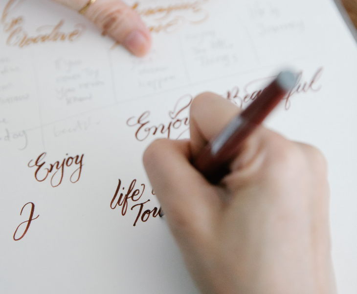 Calligraphy and hand lettering only require basic supplies, such as paint pens and markers, to get started.